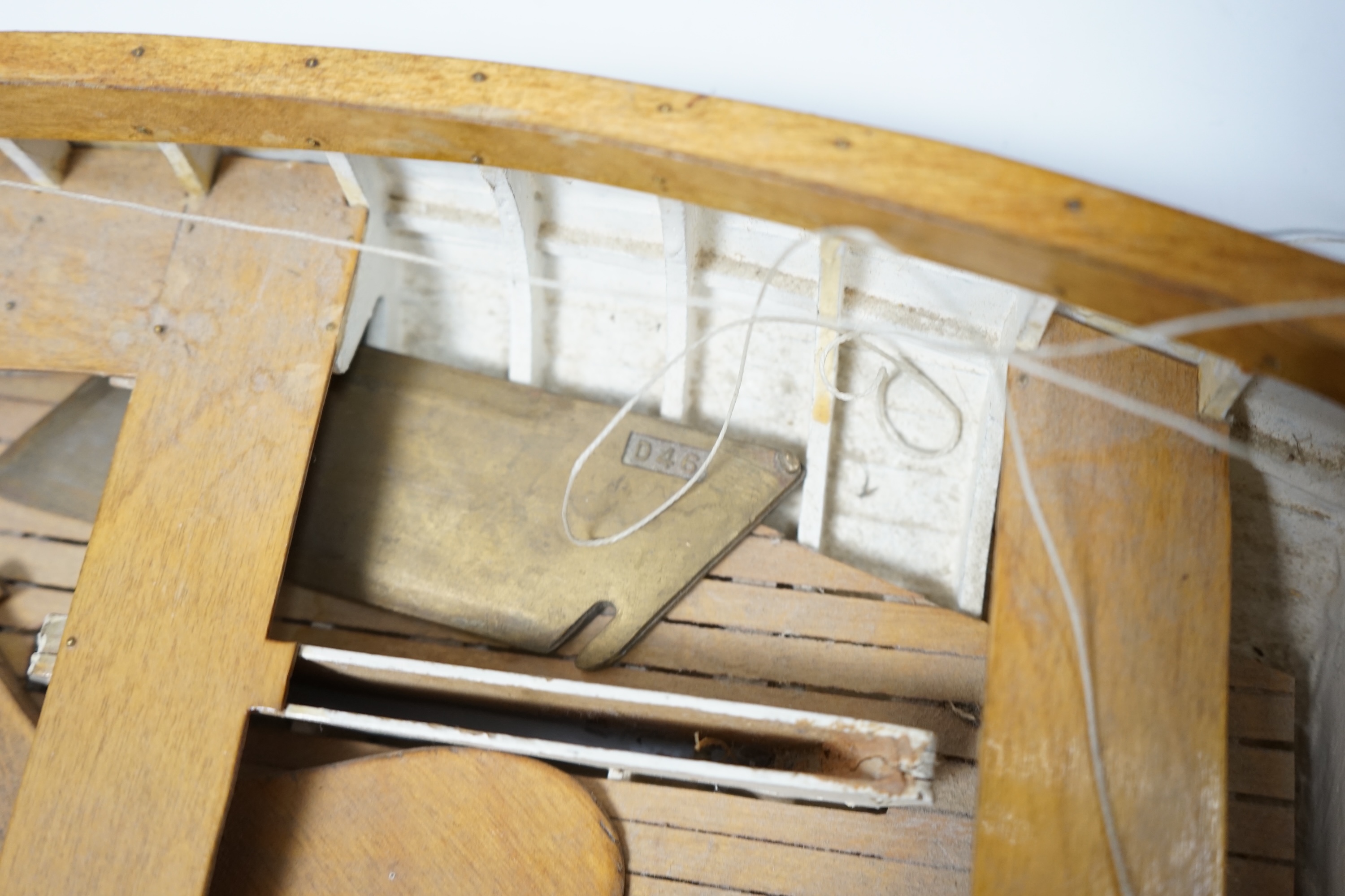 A mid 20th century kit built wooden model sailing boat, ‘Rob’, of plank on frame construction with white painted interior, hull 45cm long. Condition - fair to good.